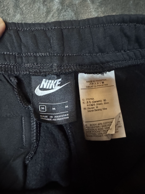 Pantalon Nike Negro Just Do It Etiqueta Naranja
