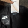 Pantalon Nike Negro Just Do It Etiqueta Naranja