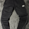 Pantalon Puma Negro Con Lineas Blancas