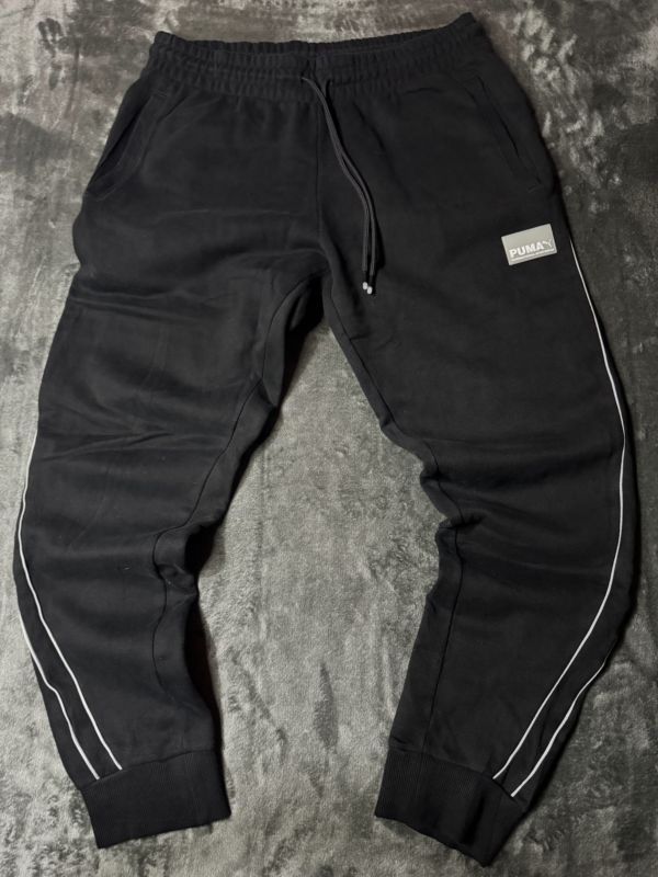 Pantalon Puma Negro Con Lineas Blancas