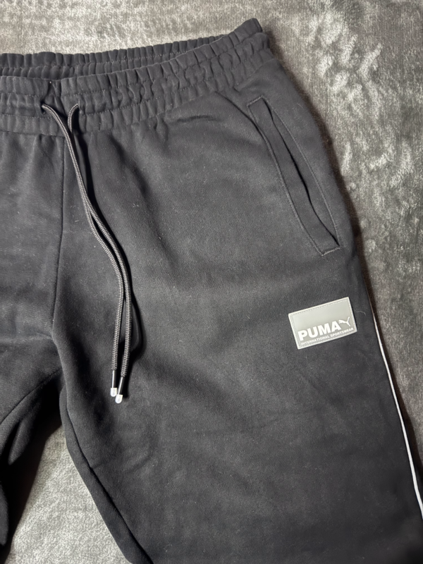 Pantalon Puma Negro Con Lineas Blancas