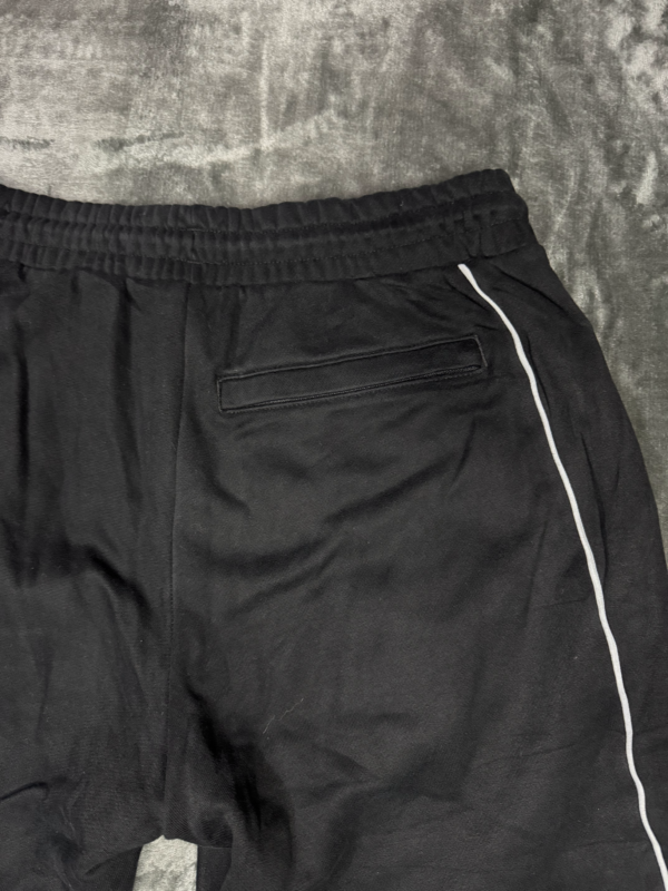 Pantalon Puma Negro Con Lineas Blancas