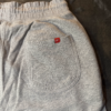 Pantalon Nike Gris Logo Blanco